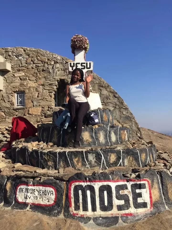 At the hilltop marker